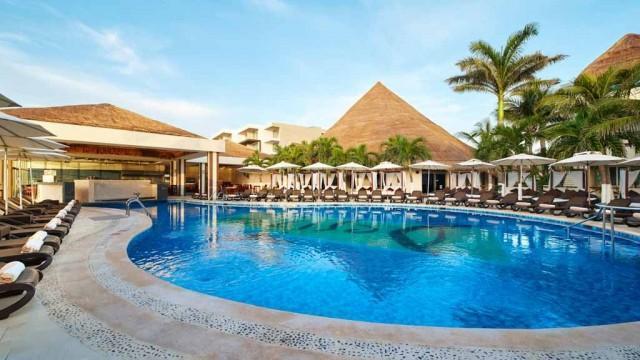 The pool area at Desire Riviera Maya, with beds and all CREDIT: DESIRE RESORTS & SPA